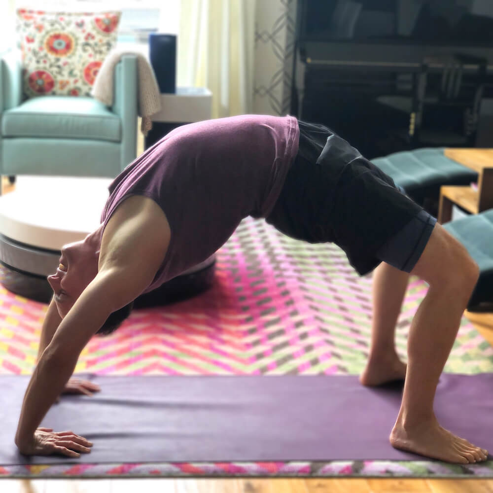 Wheel Pose in Yoga performed by Seattle Personal Trainer David